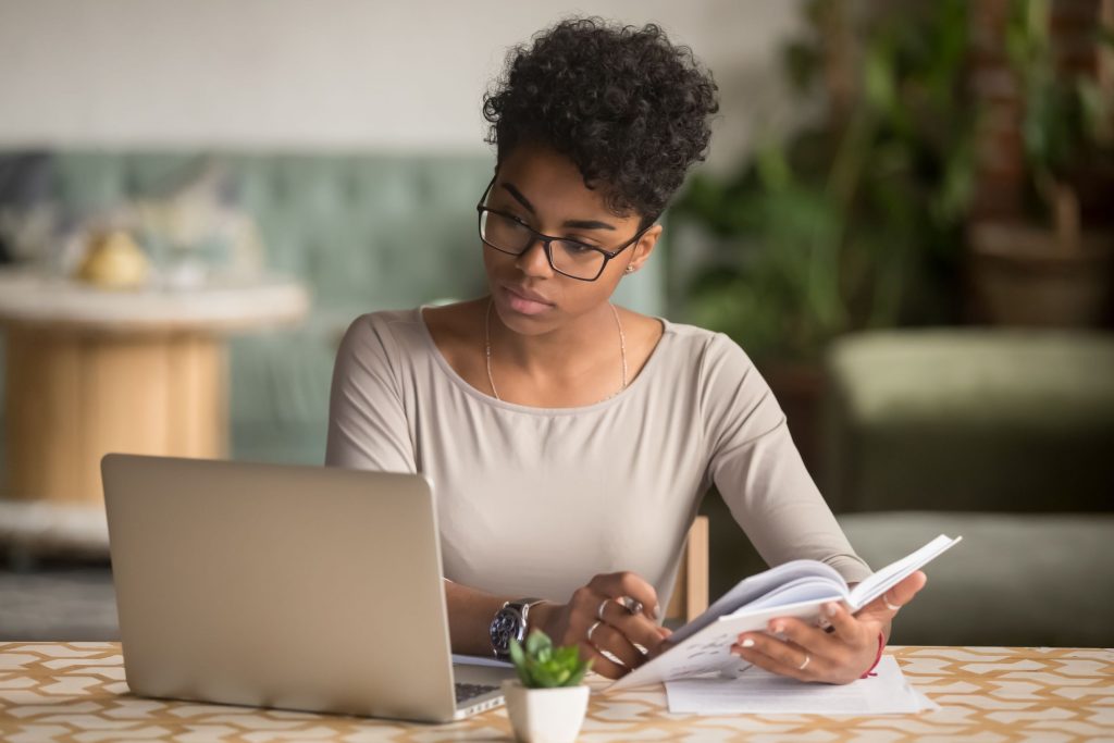 lady looking at documents customer retention